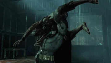 Batman carrying an opponent during combat in Batman: Arkham Asylum.
