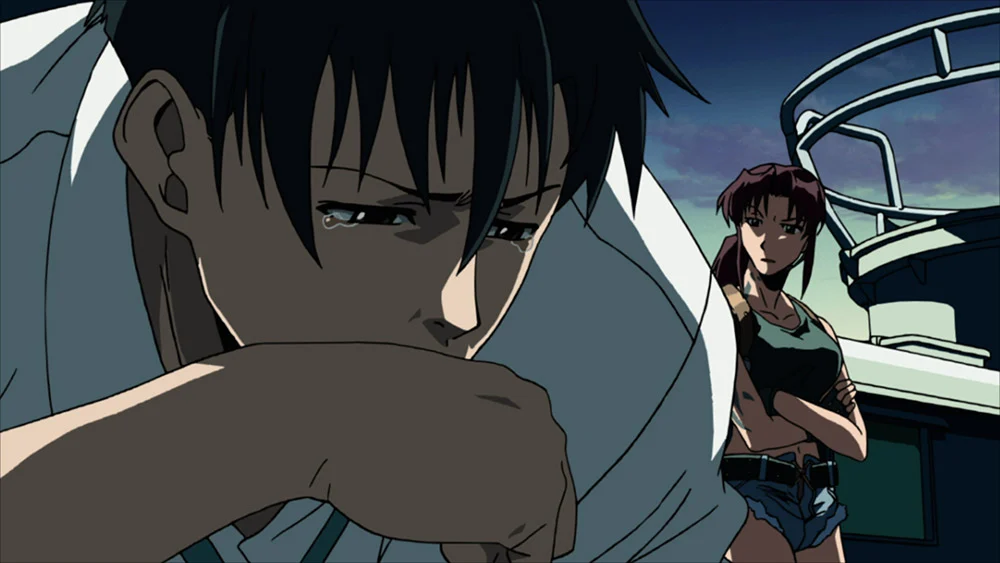 Rock in the foreground with Revy behind him aboard a boat in Black Lagoon episode 1.