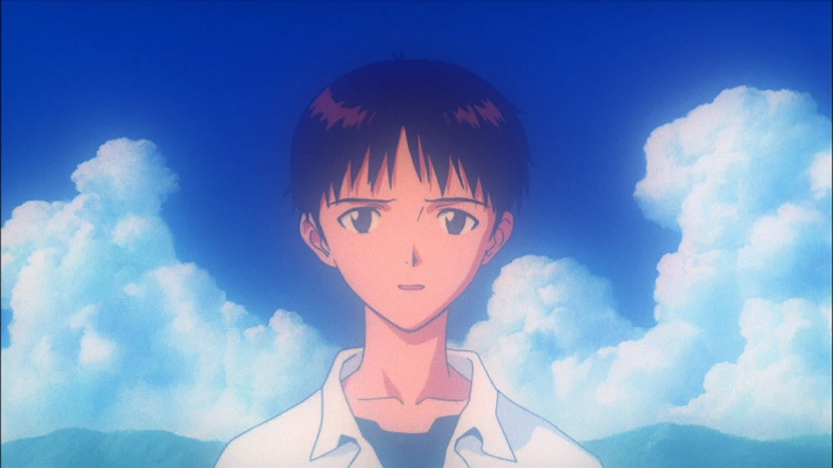 Shinji Ikari looking up at a blue sky in The End of Evangelion.