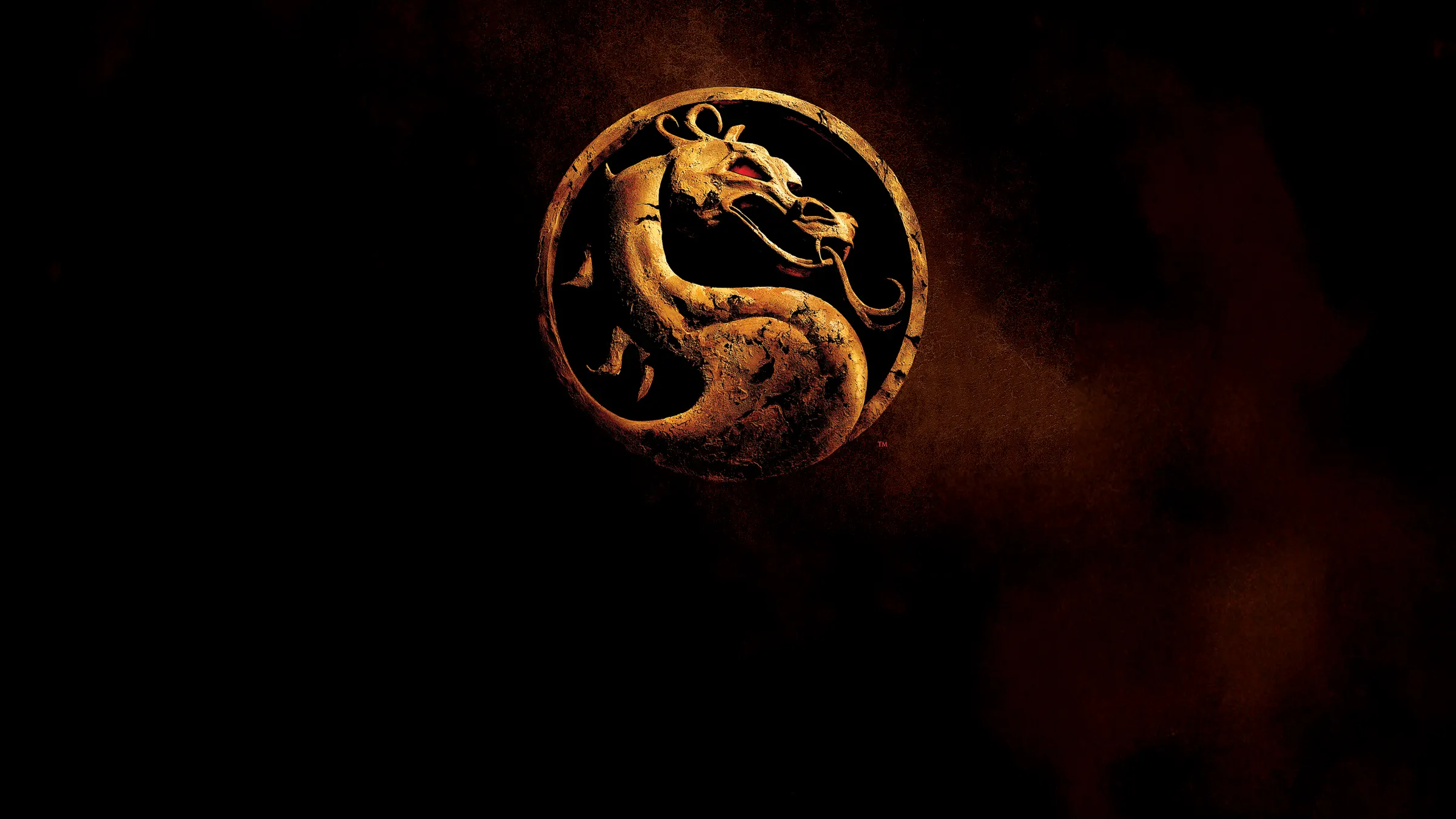 Golden dragon emblem on the key art for Mortal Kombat (1995)