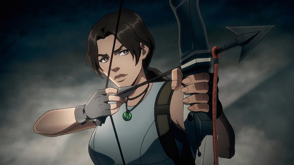 Lara Croft aiming a bow in The Legend of Lara Croft